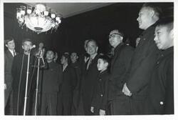 ["Black and white photograph print of Carl Albert in various poses with the Shenyang Acrobatic Troupe. January 13, 1973"]