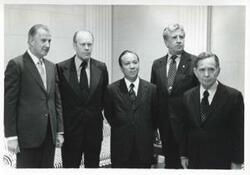 ["Black and white photograph print of Spiro T. Agnew, Gerald R. Ford, President Thieu of Vietnam, and Carl Albert posing for a picture. April 5, 1973"]