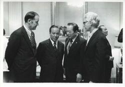 ["Black and white photograph print of Barber Conable, President Thieu of Vietnam, John Anderson, and others standing together. April 5, 1973"]
