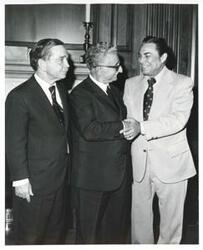 ["Black and white photograph print of Carl Albert standing with President Leone of Italy and another man. September 26, 1974"]