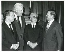 ["Black and white photograph print of Carl Albert speaking with Thomas P. O'Neill, President Leone of Italy and John Volpe. September 26, 1974"]