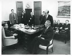 ["Black and white photograph print of Carl Albert seated and talking with Polish First Secretary Edward Gierek during his visit to the United States. Clement Zablocki is in background. October 9, 1974"]