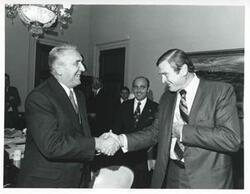 ["Black and white photograph print of Dan Rostenkowski shaking hands with Edward Gierek, Polish First Secretary. October 9, 1974"]