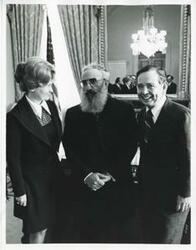 ["Black and white photograph print of Carl Albert posing with an unidentified group."]