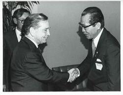 ["Black and white photograph print of Carl Albert shaking hands with an unidentified Korean man during the Korean-U.S. Interparliamentary Conference. July 22-23, 1973"]