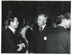 ["Black and white photograph print of Silvio Conte talking with an unidentified Korean man during the Korean-U.S. Interparliamentary Conference. July 22-23, 1973"]