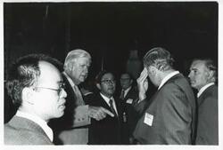 ["Black and white photograph print of Thomas P. O'Neill talking with several others during the Korean-U.S. Interparliamentary Conference. July 22-23, 1973"]