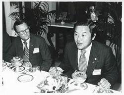["Black and white photograph print of unidentified men seated at a dinner table during the Korean-U.S. Interparliamentary Conference. July 22-23, 1973"]