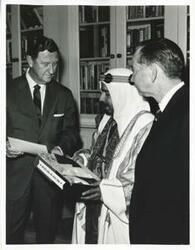 ["Black and white photograph print of Carl Albert speaking with L.H. Fountain and another unidentified man."]