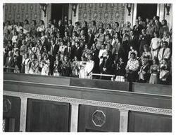 ["Black and white photograph print of unidentified people watching the Joint Session of Congress with Juan Carlos of Spain. June 6, 1976"]