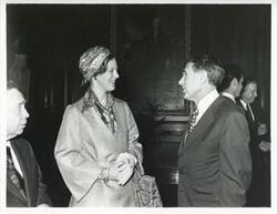 ["Black and white photograph print of John McFall speaking with Carl Albert and Queen Margrethe of Denmark."]