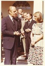 ["Color photograph print of Gerald R. Ford speaking with an unidentified woman during the British Magna Carta Delegation at the White House. June 4, 1976"]
