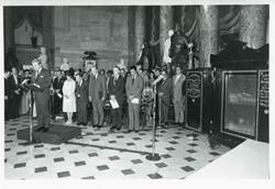 ["Black and white photograph print of Charles Percy speaking at the Centennial Safe Opening. Also shown is Lindy Boggs, Carl Albert, Gerald R. Ford, Mike Mansfield, and Edward Brooke."]