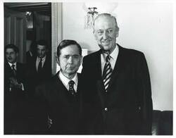 ["Black and white photograph print of Carl Albert posing with Les Arends."]