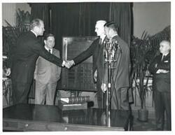 ["Black and white photograph print of Gerald R. Ford, Carl Albert, John W. McCormack, and others."]
