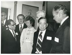 ["Black and white photograph print of Lawrence F. O'Brien and wife, John W. McCormack, Carl Albert, Robert Strauss at an unidentified function."]