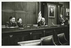 ["Black and white photograph print of Carl Albert, Thomas E. Morgan, and Dean Rusk."]