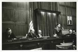 ["Black and white photograph print of Carl Albert speaking at an unidentified function."]