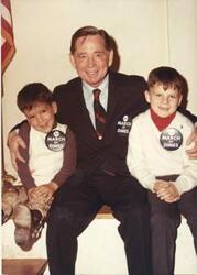 ["Black and white photograph print of Color photograph print of Carl Albert with Tracy Greenwood. March of Dimes, 1969"]