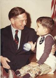 ["Black and white photograph print of Color photograph print of Carl Albert with Tracy Greenwood. March of Dimes, 1969"]
