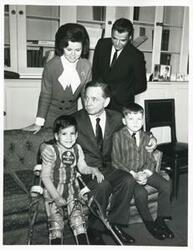 ["Black and white photograph print of Carl Albert with Tracy Greenwood. March of Dimes, 1969"]