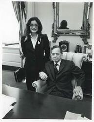 ["Black and white photograph print of Carl Albert and Felda Looper posing for a picture."]