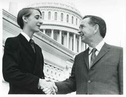 ["Black and white photograph print of Walter Wiess (page) shaking hands with Carl Albert on the steps of the Capitol. August 14, 1970"]