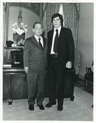 ["Black and white photograph print of Carl Albert posing with Brad Durham on April 30, 1975"]