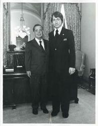 ["Black and white photograph print of Carl Albert posing with Ron Ressy on April 30, 1975"]