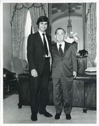 ["Black and white photograph print of Carl Albert posing with Matt Hodes on April 30, 1975"]