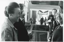 ["Black and white photograph print of a Carl Albert with the House delegation in an interior in USSR, Romania, and Yugoslavia in August 1975"]