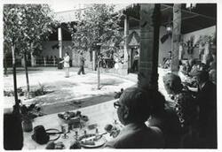 ["Black and white photograph print of people at the House delegation trip. August 1975"]