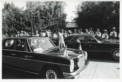 ["Black and white photograph print of group of people during the House delegation trip. August 1975"]
