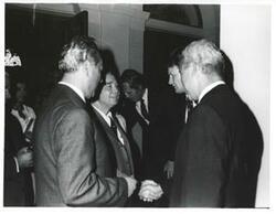["Black and white photograph print of Carl Albert standing with several men during the House delegation trip to USSR, Romania, Yugoslavia. August 1975"]