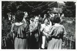 ["Black and white photograph print of Carl Albert and Mary Albert with several people during the House delegation trip to USSR, Romania, Yugoslavia. April, 1975"]