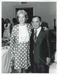 ["Black and white photograph print of Carl Albert with Kathryn Prewitt."]