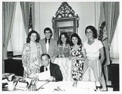 ["Black and white photograph print of Carl Albert posing with the 1975 Summer Interns - Sue Waldron, Steve Schiff, Laura Moning, Kitty Mofeit, and Debbie Hutchins."]