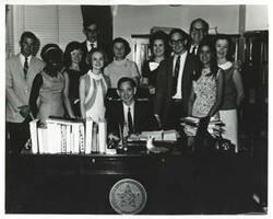 ["Black and white photograph print of Carl Albert posing with the 1967 summer interns. See photo for individual names."]
