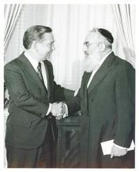 ["Black and white photograph print of Rabbi Shlomo Goren, the Chief Rabbi of Israel shaking hands with Carl Albert on June 18, 1974"]