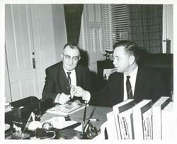 ["Black and white photograph print of Carl Albert with unidentified men."]