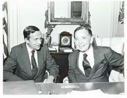 ["Black and white photograph print of Carl Albert with two unidentified men."]