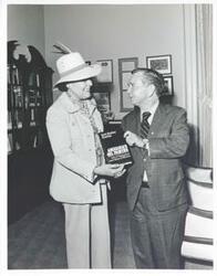 ["Black and white photograph print of Carl Albert standing with Ruth Sheldon Knowles. May 23, 1975"]