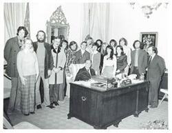 ["Black and white photograph print of Carl Albert posing with several Dag Hammershjold College students. January 29, 1974"]