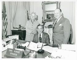 ["Black and white photograph print of Carl Albert posing with Helen Grace and Tom Ed Grace. September 28, 1976"]