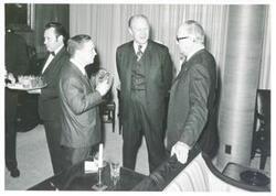 ["Black and white photograph print of Carl Albert posing with Gerald R. Ford and Otto Passman."]