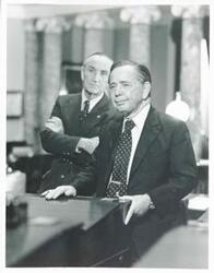 ["Black and white photograph print of Speaker of the House, Carl Albert of Oklahoma with Mike Mansfield. 1976.  May be a Time Inc. photo."]