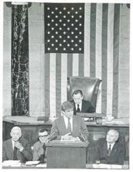 ["Black and white photograph print of Jack Kemp speaking at the anniversary of the First Continental Congress. September 25, 1974"]