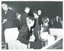 ["Black and white photograph print of Lyndon B. Johnson, John F. Kennedy, Jacqueline Kennedy and others. Carl Albert is in the background."]