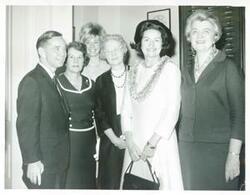 ["Black and white photograph print of Carl Albert posing with women from McAlester, OK who are visiting Washington, D.C."]