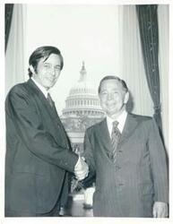 ["Black and white photograph print of Carl Albert shaking hands with N.G. Thornton, May 2, 1972"]